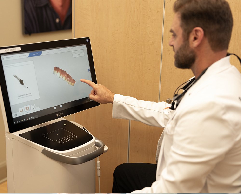 Dentist reviewing a CEREC digital design on screen